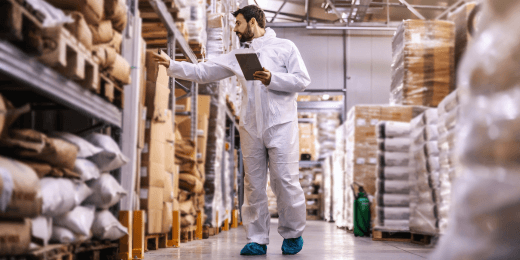 An inspector ensuring the compliance with the dry food storage guidelines