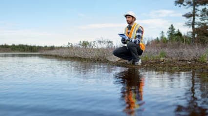 biologist analysing water test results