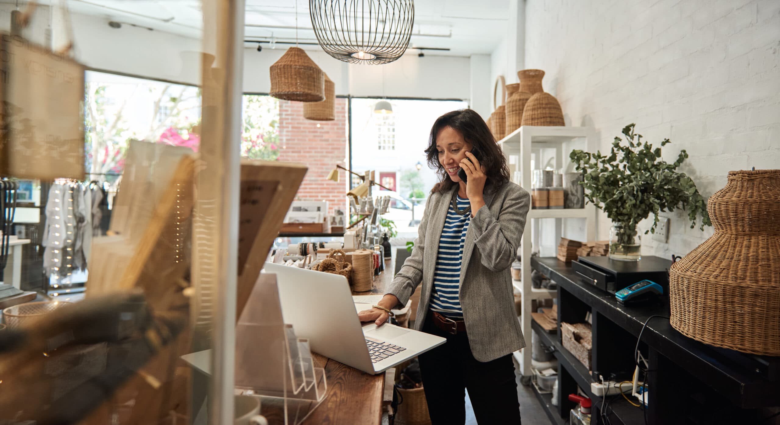A manager doing checks using specialty retail technology solutions