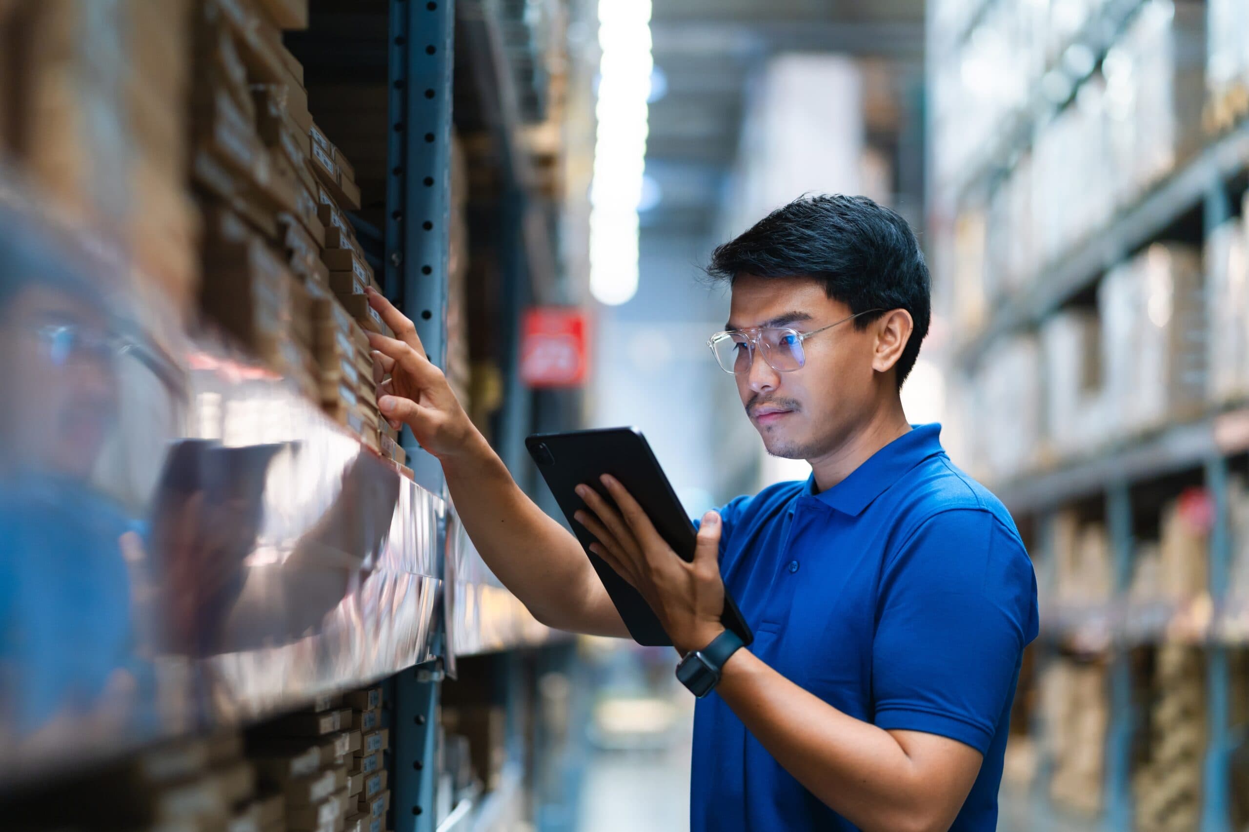 A manager doing checks using retail loss prevention software