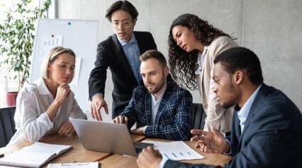 employees working together using a tablet