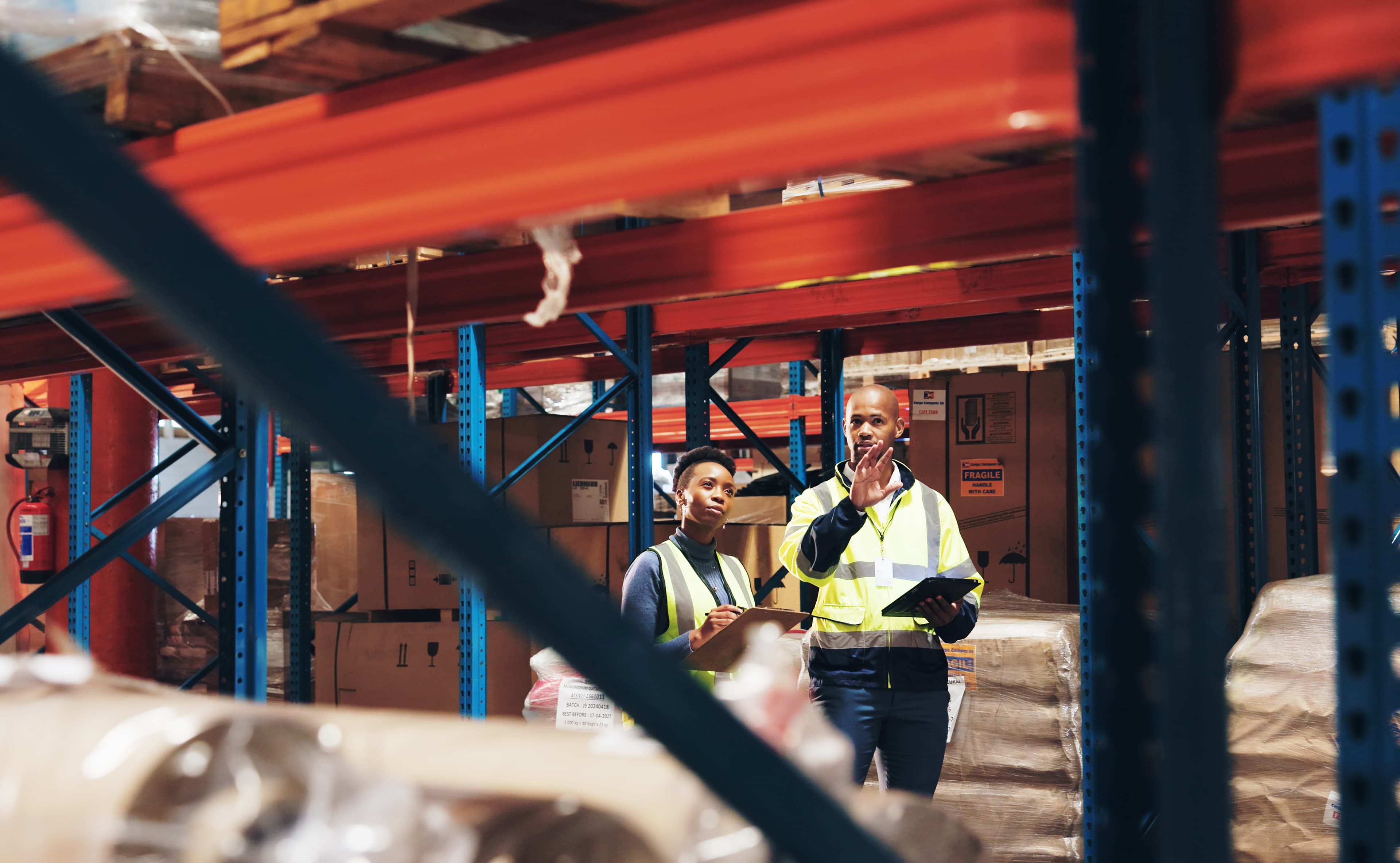 Two senior inspectors doing vendor compliance checks using a digital solution