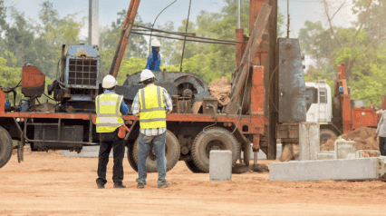 Pile driving at construction site