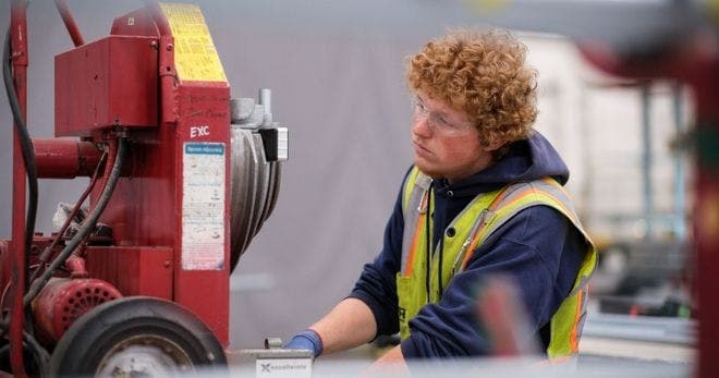 A man operating a machine