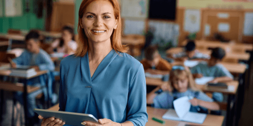 A teacher monitoring her class with a tablet.