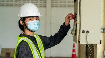 person looking at iso 7000 signs