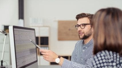 two professionals conducting process analysis
