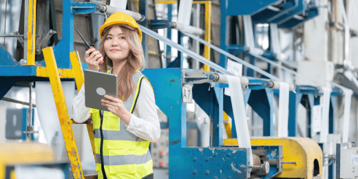 Female engineer in a hard hat in an industrial plant