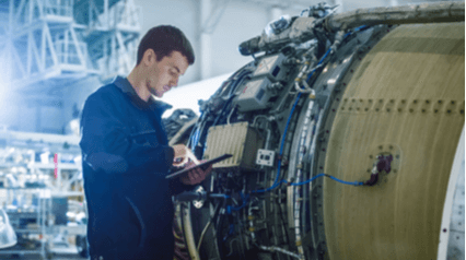 worker doing maintenance work on an equipment