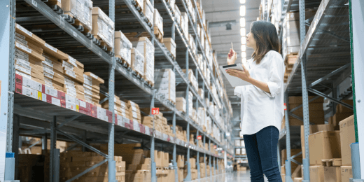 A manager doing inventory replenishment checks